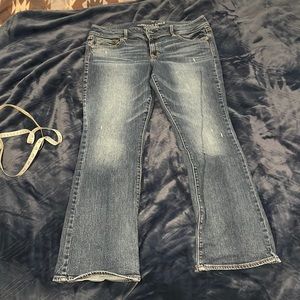 Distressed American Eagle Kick Boot Jeans